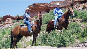 Horseback riding to Eagle Ridge under the Colorado rimrock.